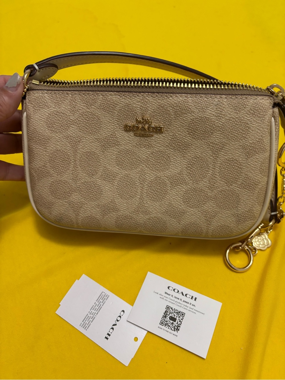 Coach Neutral Signature Canvas Mini Wristlet with Gold Hardware